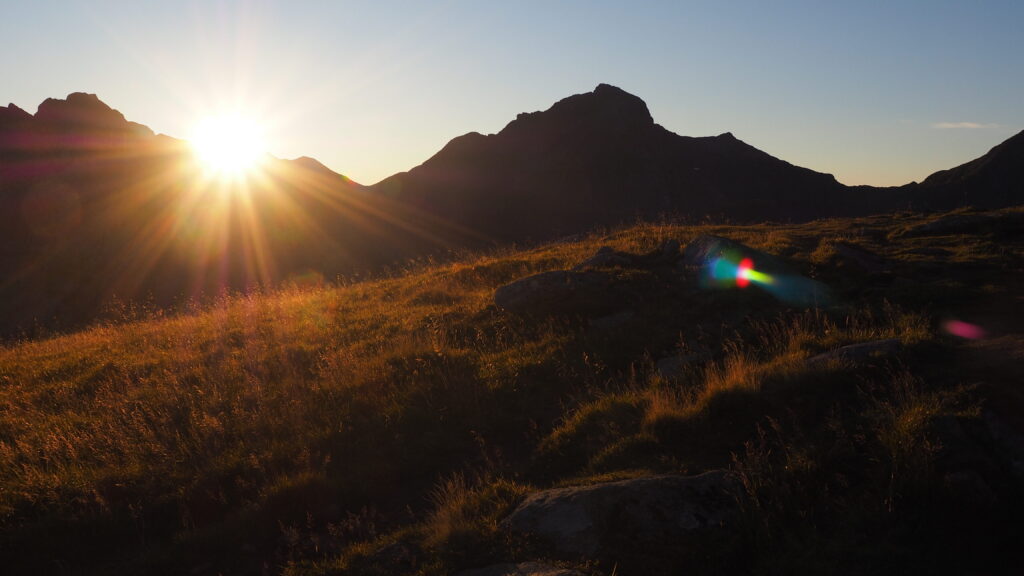 Sunset over mountain ridge, Lofoten, Norway