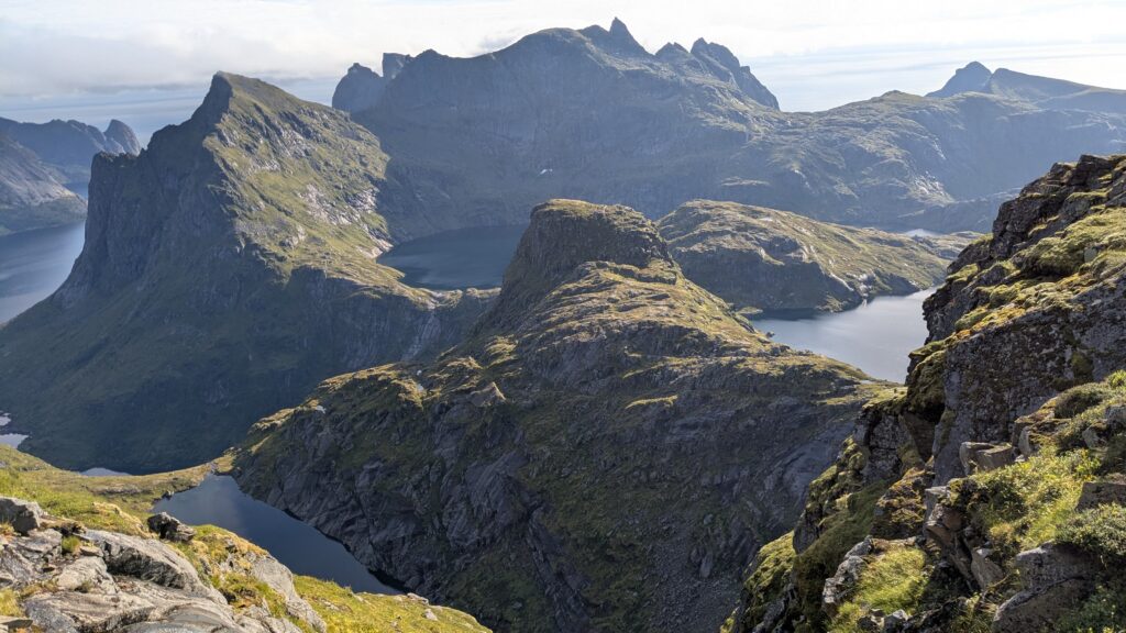 jagged mountain ridge and fjord landscape, Hermannsdalstinden, Lofoten, Norway