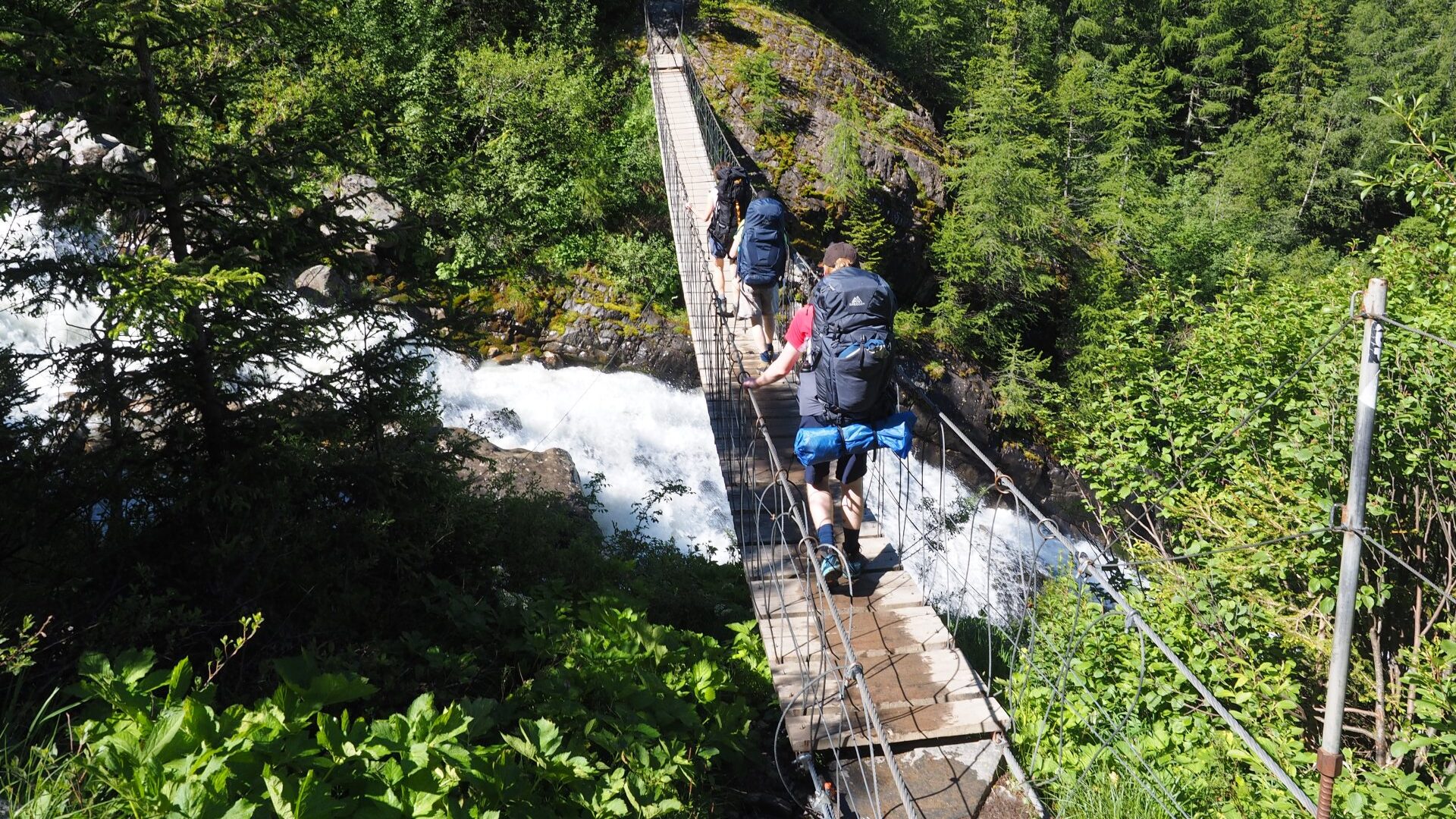 suspension bridge above the Bionassay glacier valley, Tour du mont blanc