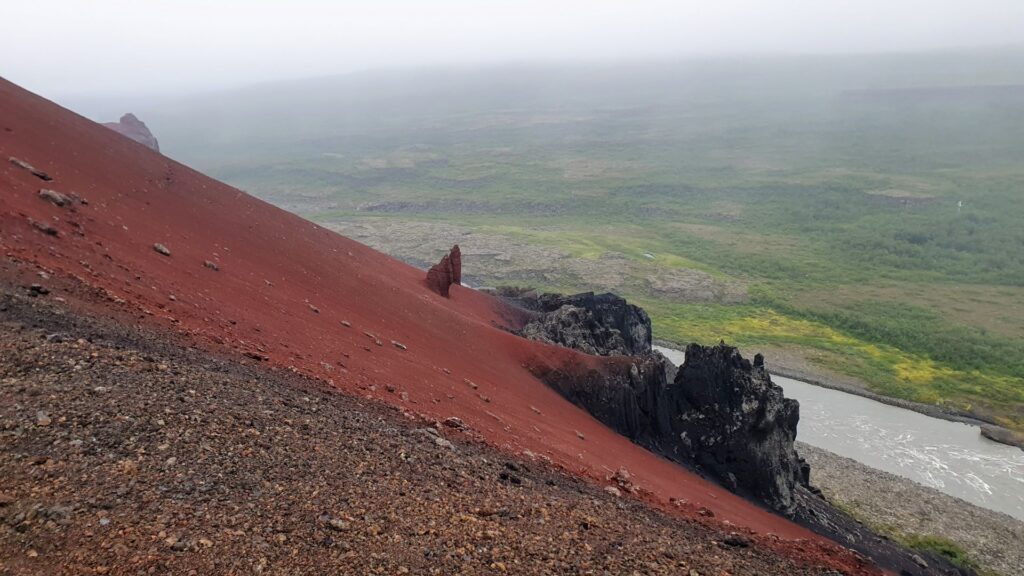 View from the red volcanic slopes of Rauðhólar overlooking the Jökulsá á Fjöllum canyon in North Iceland.